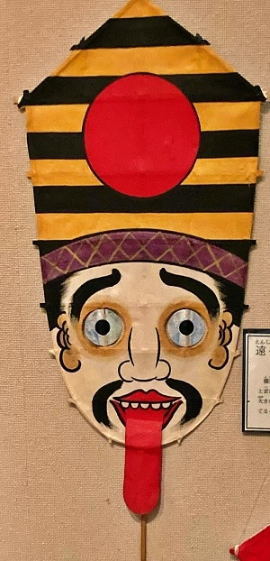 Aquilone con personaggio che fa la lingua